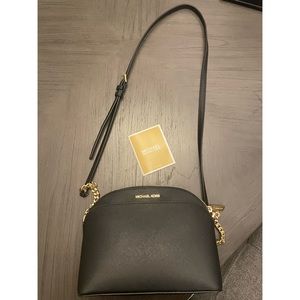 Brand new Michael Kors Black and Gold classic crossbody purse